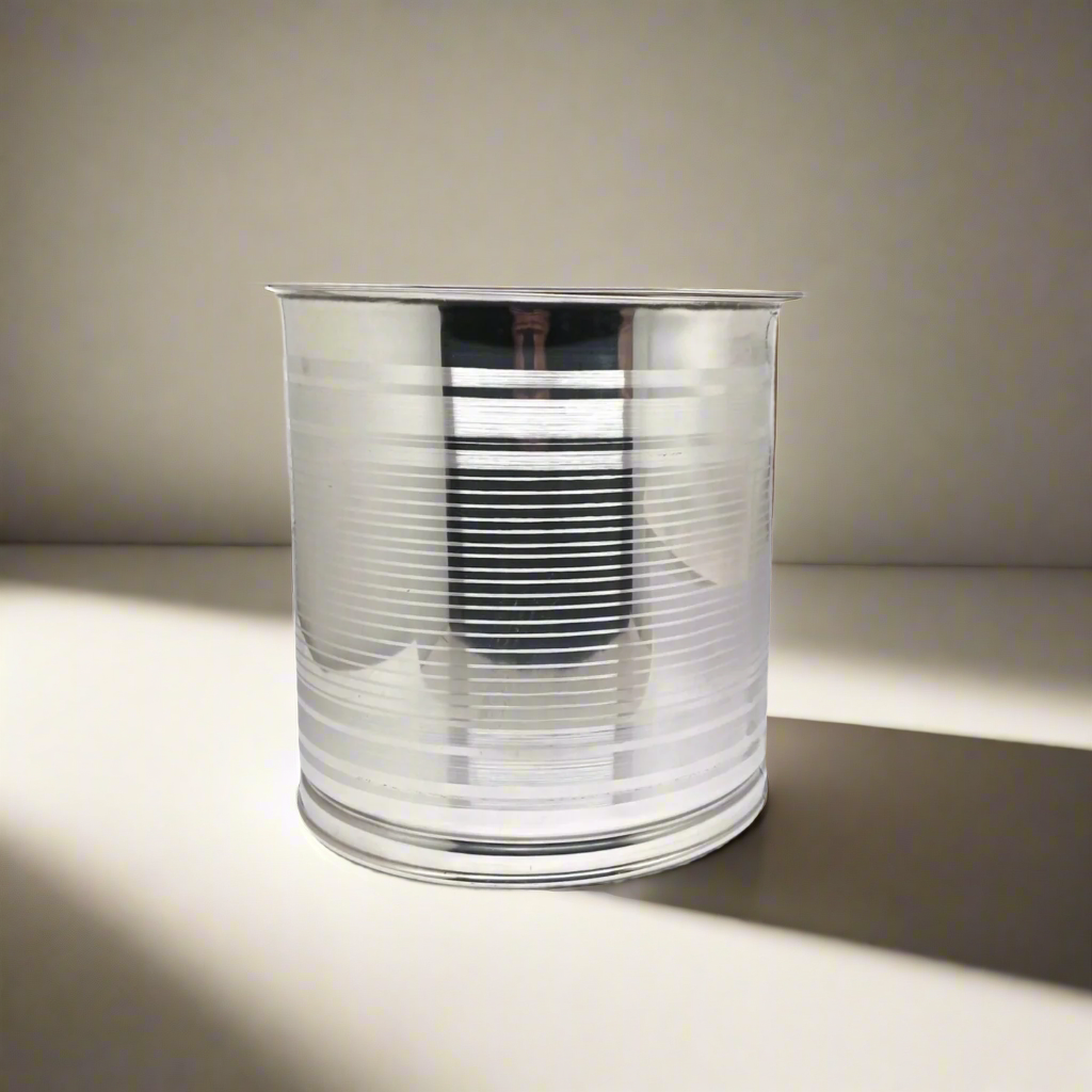 Clear glass vase with ribbed design on a neutral background