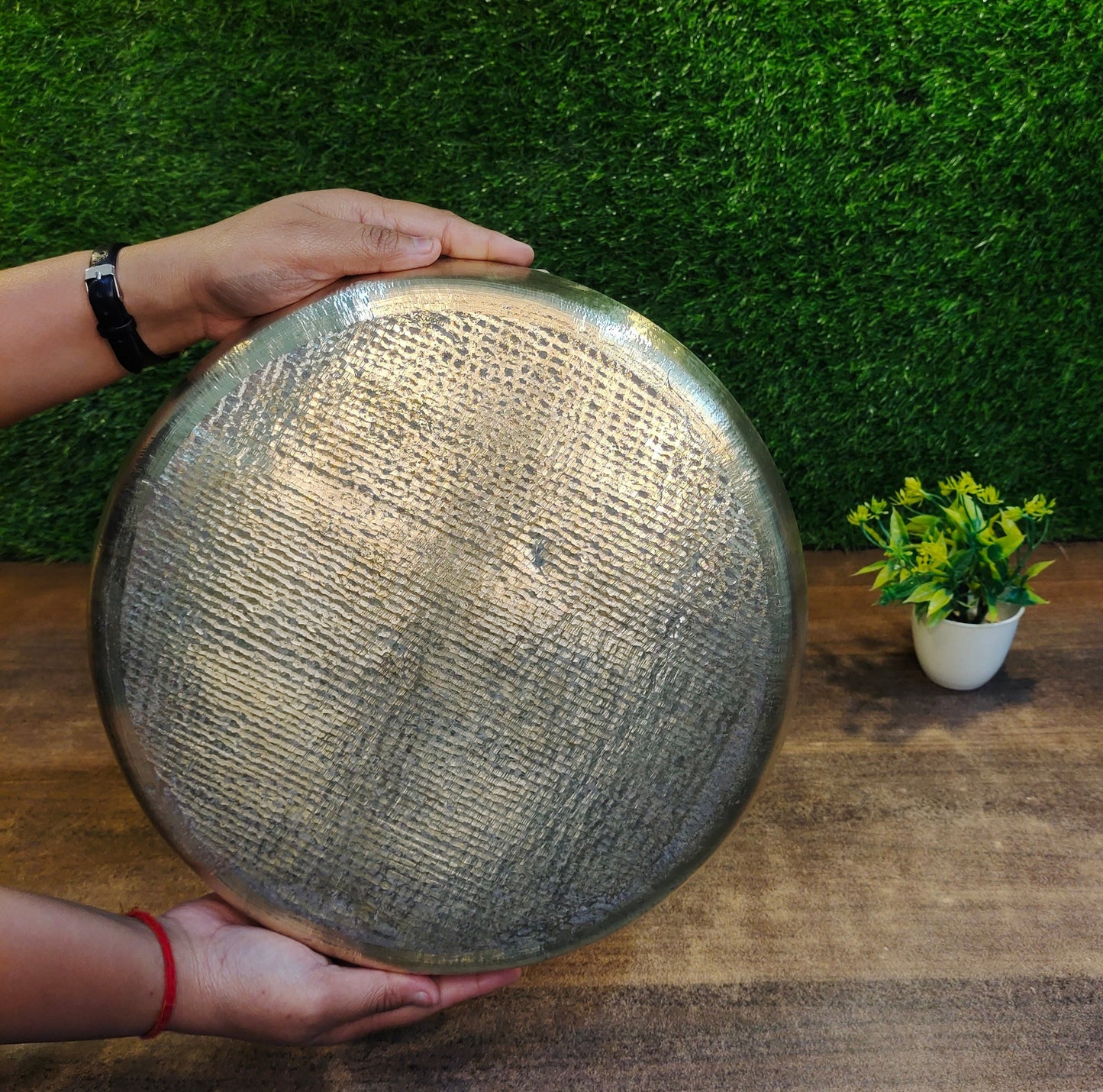 side view of pure brass thali