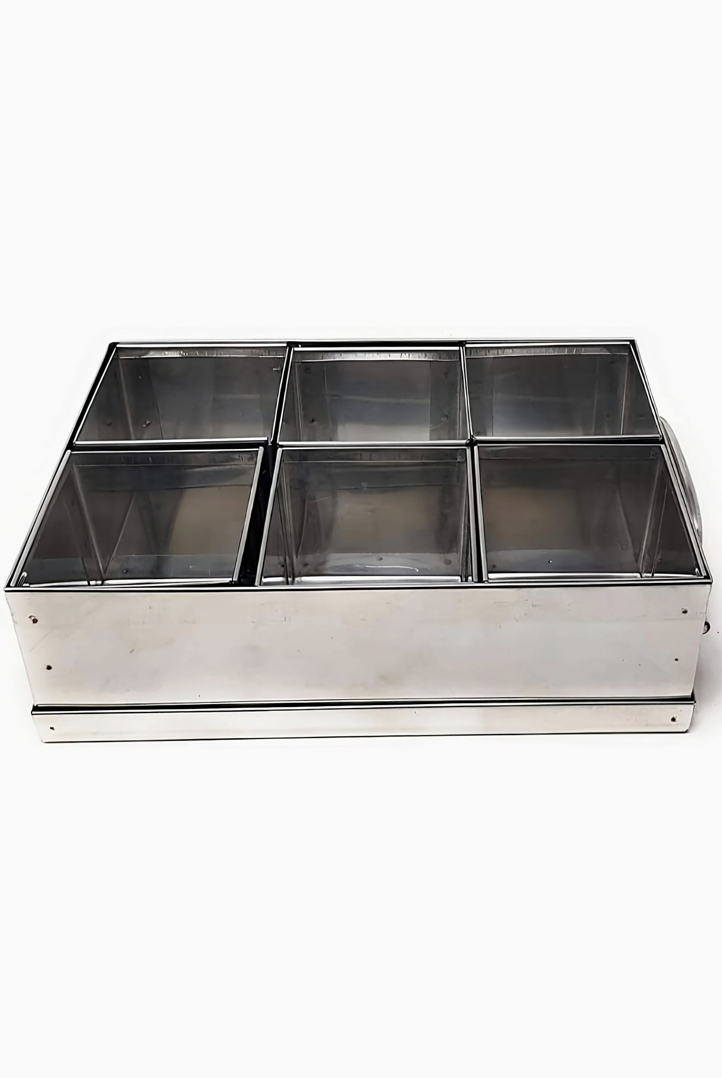 Metallic tray with compartments on a white background