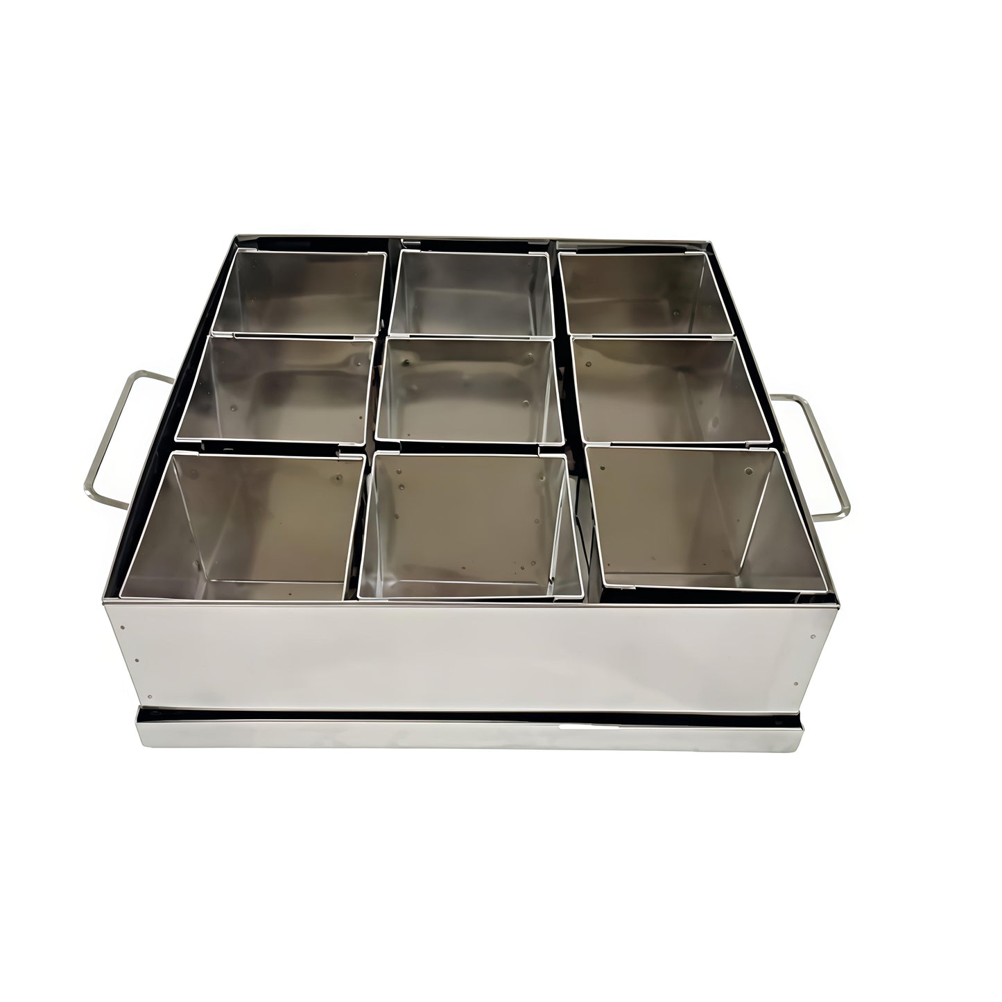 Metallic grill with multiple compartments on a white background