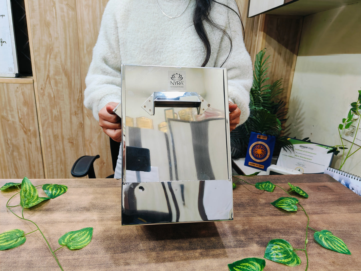 Showing in hand Stainless Steel Premium Idli Maker/Cooker with Multi-Plate Idli Stand