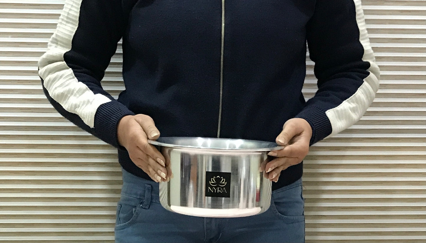 Showing the finishing of induction based aluminium bhagona