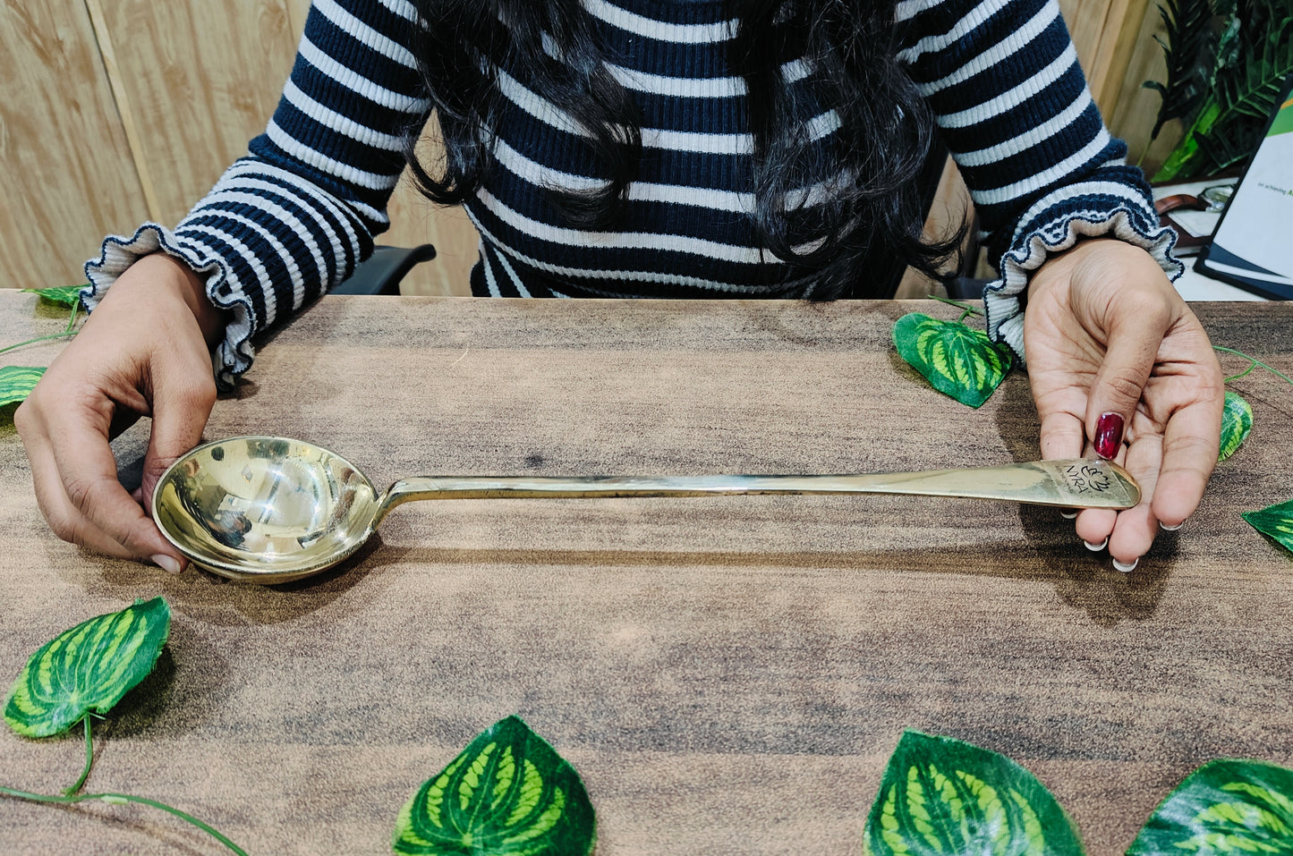 brass serving spoon