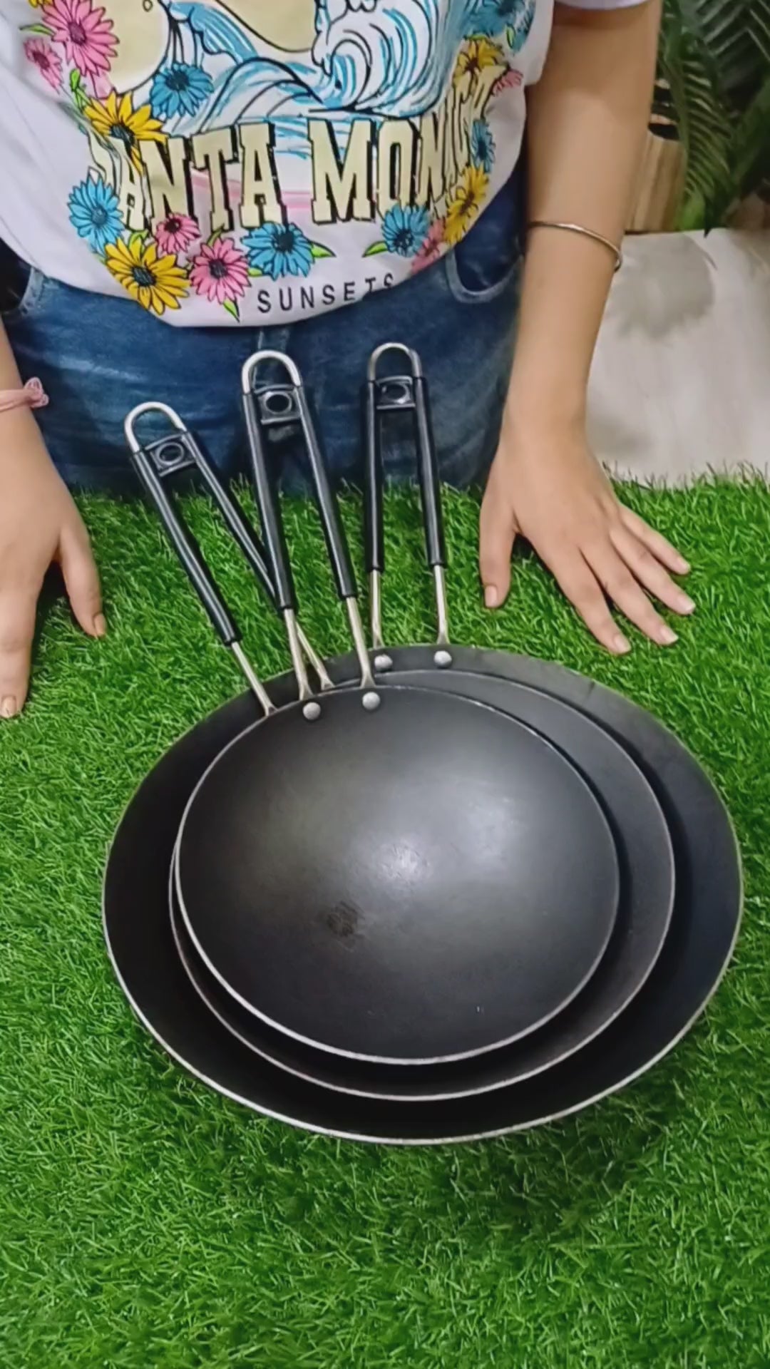 showing in quality and finishing of different sizes of Iron Chinese Wok with Steel Handle