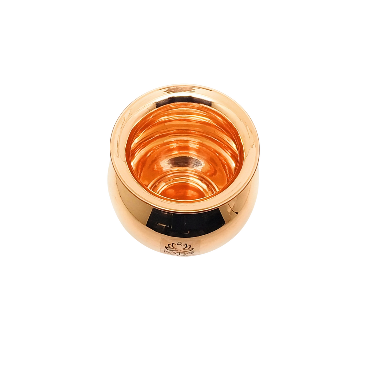 A small metallic copper-colored cup or bowl with a reflective finish, shown from a top-down view on a plain white background.