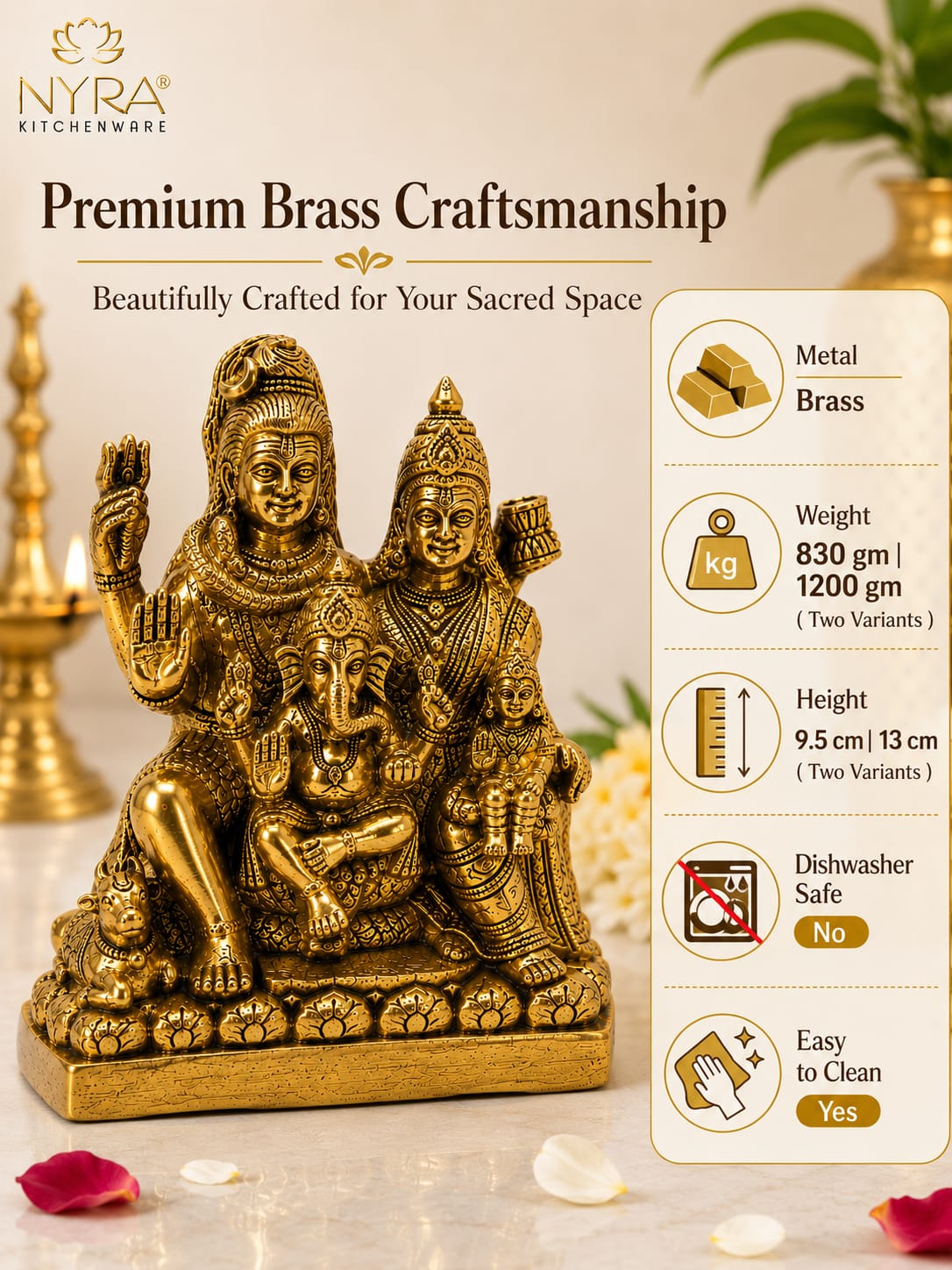 A brass statue of a Hindu family deity triad with Ganesha, shown on a light beige background with decorative props. The image includes the NYRA Kitchenware logo and a vertical list of product features on the right, including weight, height, dishwasher safe status, and ease of cleaning.