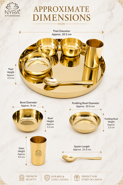 A dimension diagram for a gold-colored traditional Indian thali set, showing approximate measurements for the thali diameter, bowls, glass cup, and spoon. The image features a golden thali with four bowls, a small glass cup, and a spoon on a light marble background with text overlays indicating dimensions.