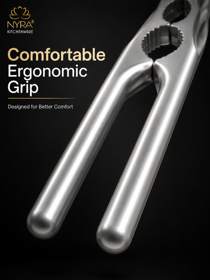 A close-up promotional shot of a metallic kitchen tool with ergonomic handles on a black background, with NYRA Kitchenware branding and the text 'Comfortable Ergonomic Grip' and 'Designed for Better Comfort' overlaid.