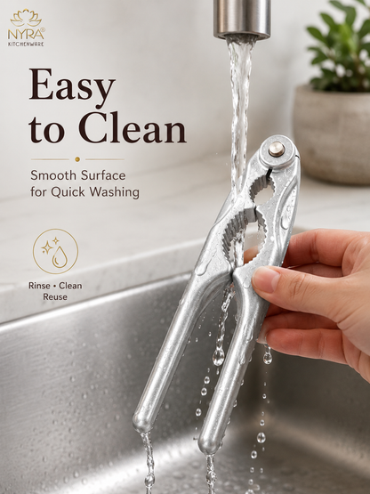 A hand holding a stainless steel kitchen cleaning tool under running water in a sink, with text on the left reading 'Easy to Clean' and 'Smooth Surface for Quick Washing.' The NYRA Kitchenware logo appears in the top left.