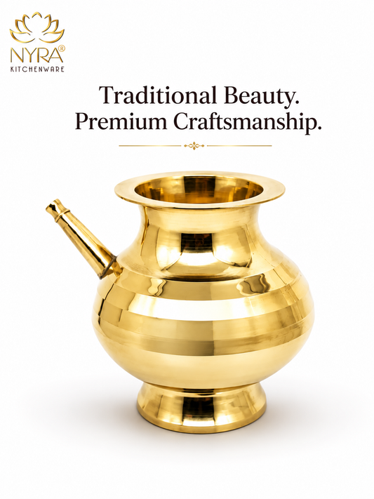 A polished brass traditional Indian kitchen vessel, likely a coppera or kalash, shown on a white background with the NYRA Kitchenware logo and the text 'Traditional Beauty. Premium Craftsmanship.