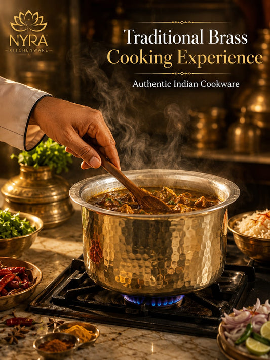 Person cooking with traditional brass cookware on a stove, featuring Nyra Kitchenware branding.