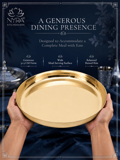 A gold-colored round serving platter held by two hands against a dark navy blue background with promotional text and decorative borders. The NYRA Kitchenware logo is visible in the top left.