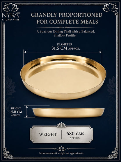 A gold-colored oval serving platter shown on a dark navy blue background with decorative text and dimension lines indicating its diameter of 31.5 cm, height of 4.