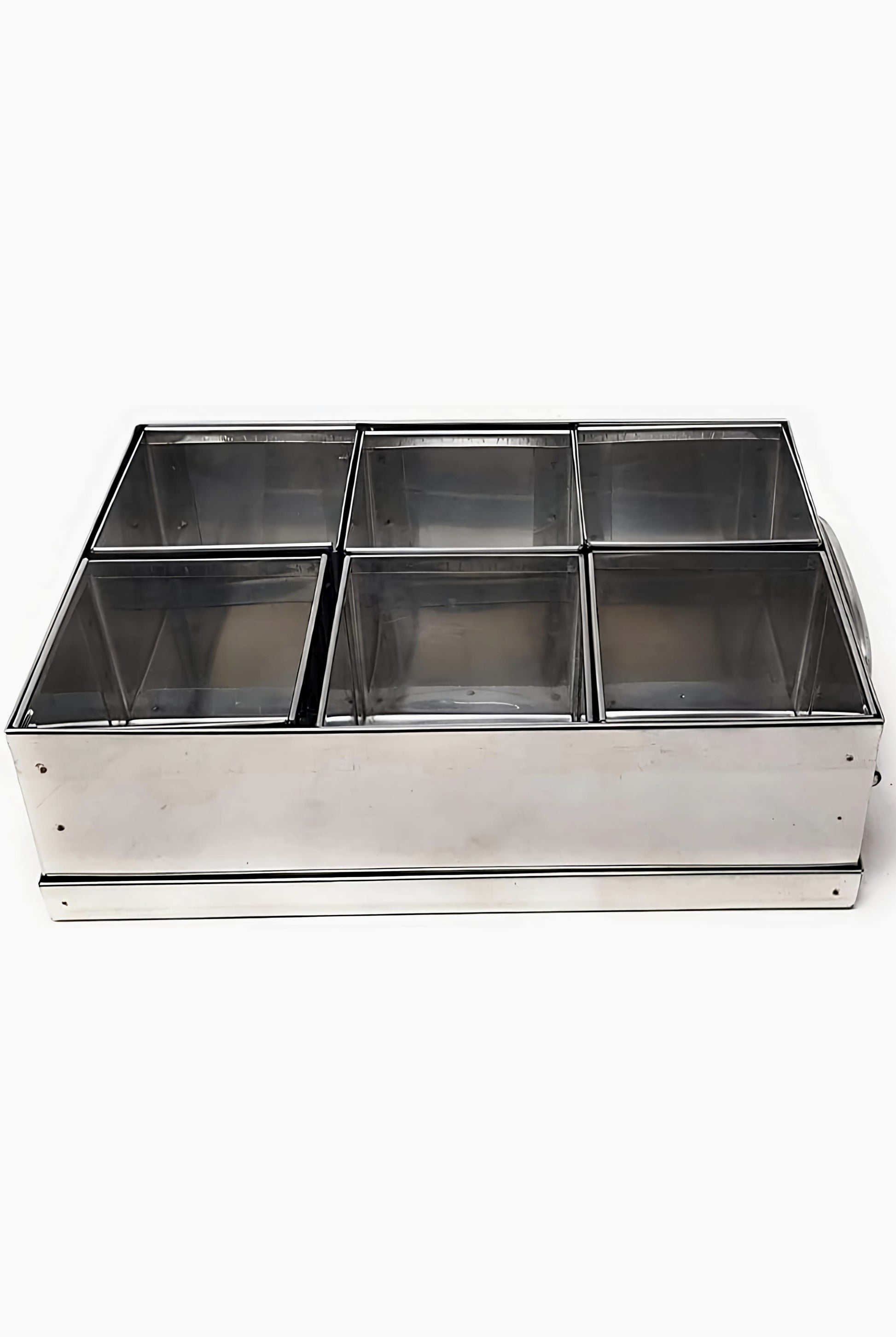 Metallic tray with compartments on a white background