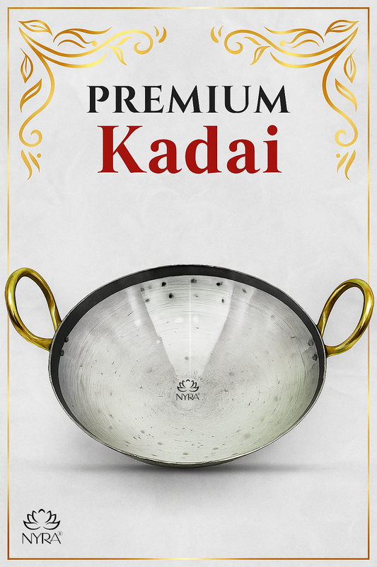 Premium kadai with gold handles on a white background, featuring the Nyra brand.