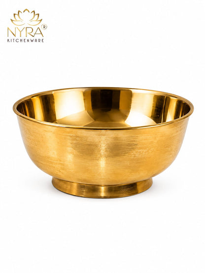 A polished gold-colored stainless steel mixing bowl with a brushed exterior and reflective interior, shown on a white background with the NYRA Kitchenware logo in the top left corner.