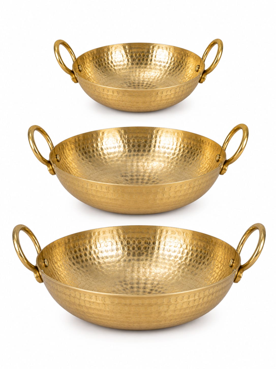 Three hammered brass kadhai pans of different sizes, arranged vertically on a clean white background.