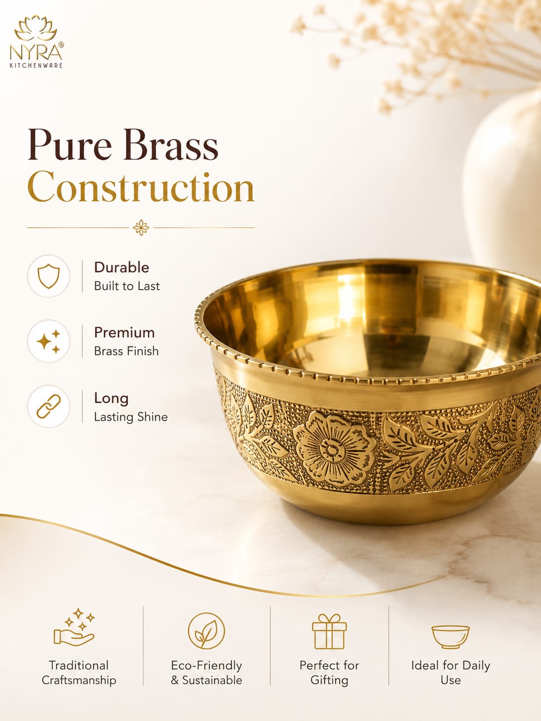 A decorative brass bowl with embossed floral patterns, shown on a light marble surface with promotional text reading 'Pure Brass Construction' and feature icons on a warm beige background. NYRA Kitchenware logo is visible in the top left.