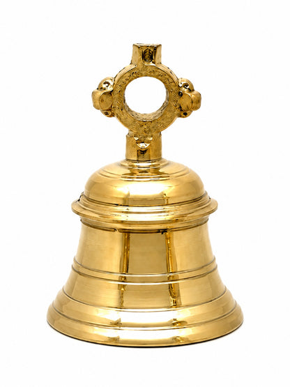 A polished brass bell with a decorative hanging loop and flared base, shown on a plain white background.