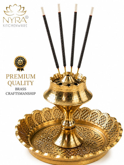 A brass incense holder with five incense sticks, shown on a white background with NYRA Kitcheware branding and 'Premium Quality Brass Craftsmanship' text.