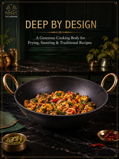 A promotional graphic for 'Deep By Design' by Nyra Kitchenware, featuring a black cast-iron kadhai filled with a colorful fried and sautéed Indian dish on a dark marble countertop.