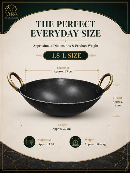A product information graphic for a black cast iron kadhai/wok with brass handles, showing approximate dimensions, weight, and capacity. The image includes the brand name 'Nyra Kitchenware' and text reading 'The Perfect Everyday Size' and '1.