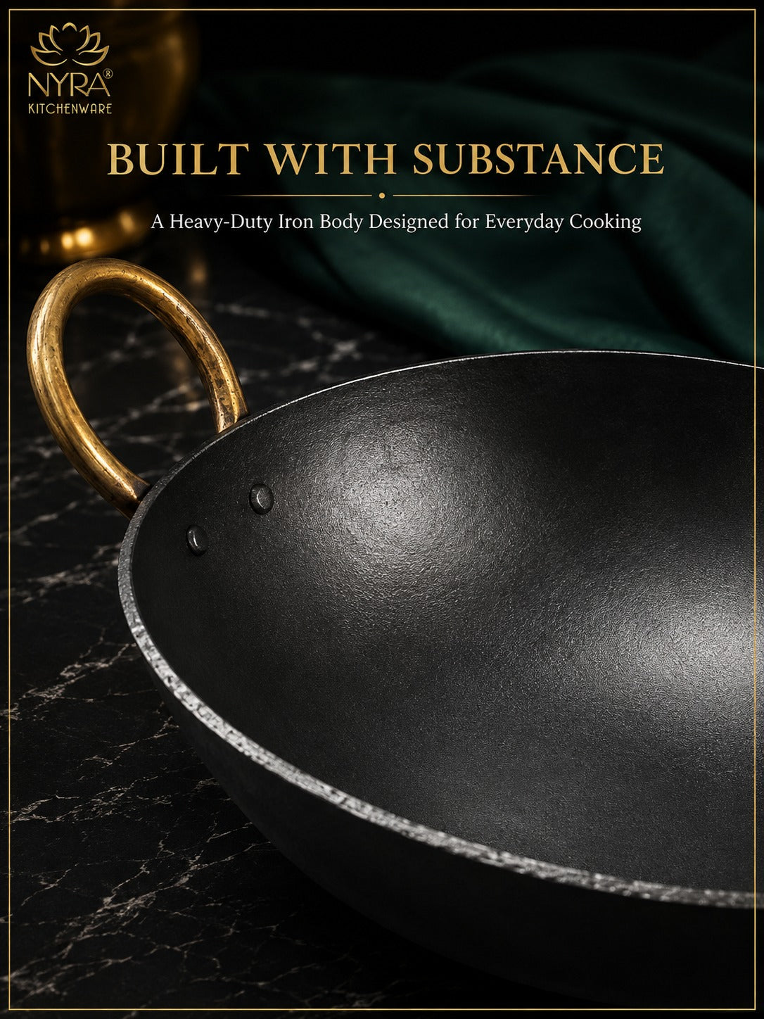 A heavy-duty black iron kadhai wok with a gold-colored handle, shown on a dark marble surface with a green cloth in the background. The image features promotional text at the top reading 'BUILT WITH SUBSTANCE' and shows the NYRA KITCHENWARE brand logo.