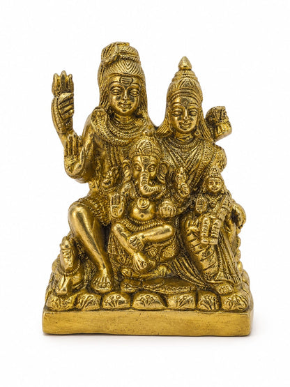 A brass statue depicting Lord Shiva and Goddess Lakshmi with Ganesha and a child, shown on a plain white background.