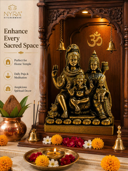 Nyra Kitchenware brass Lord Hanuman and Gaurav statue set in a carved wooden temple niche with an Om symbol, surrounded by marigolds, a copper pot, incense, and a brass diya, with a product info panel on the left.